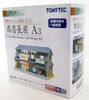 Tomytec (Building 054-3) Corner Rowhouse with Shops A3 (N scale)