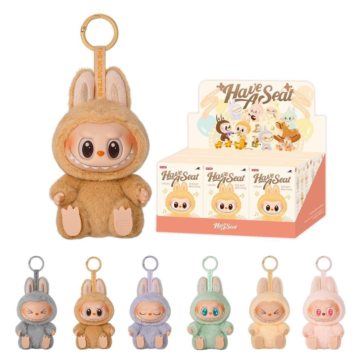 POP MART The Monsters Labubu Have A Seat Blind Box Plushie Keychain | Urban Outfitters POP MART The Monsters Labubu Have A Seat Blind Box Plushie Keychain | Urban Outfitters