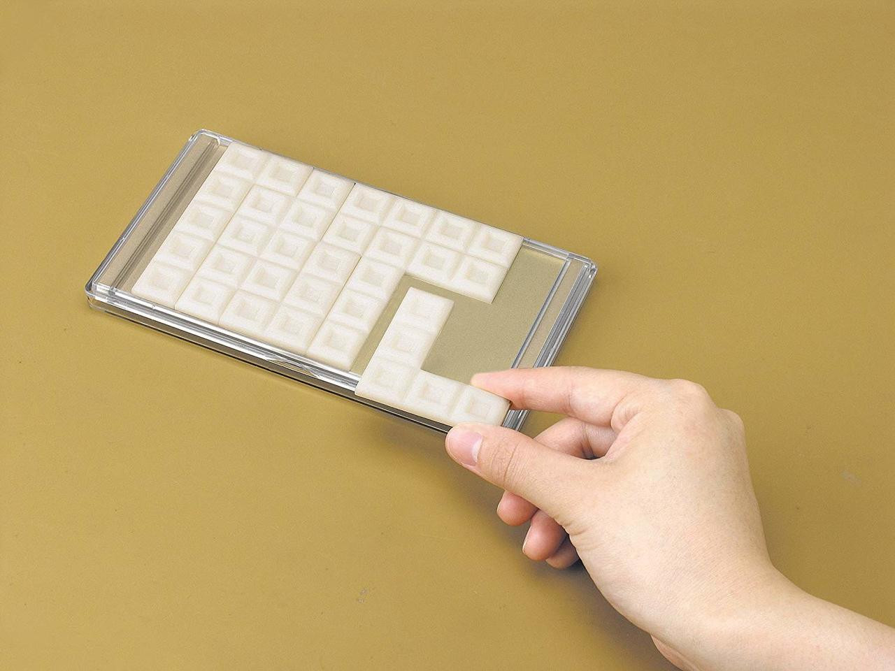 Hanayama Brain Teaser Meiji White Chocolate Puzzle