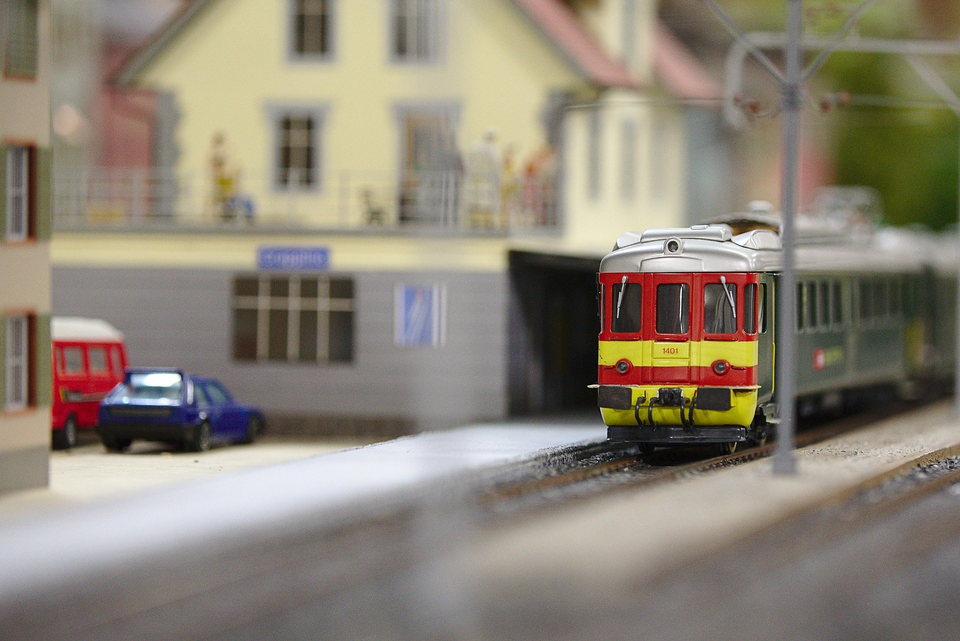 Close-up of a model train running along tracks