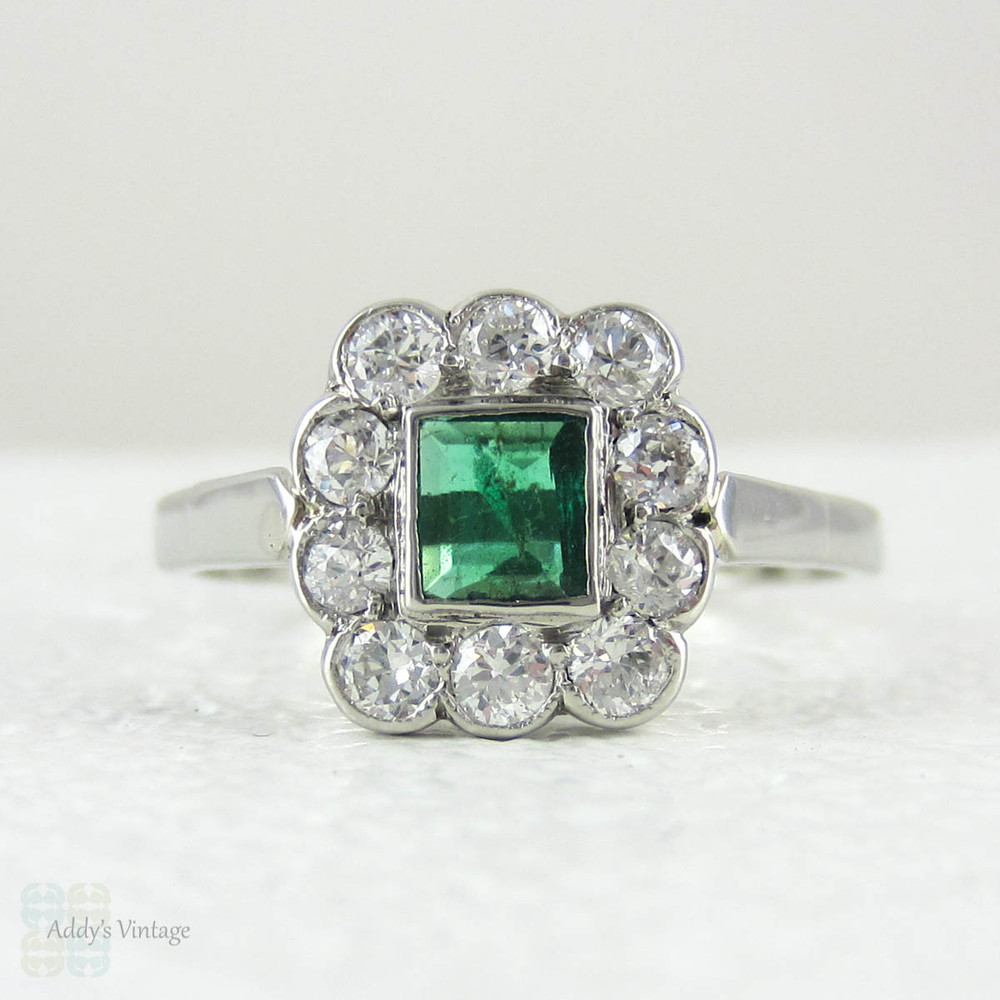 Art Deco Emerald & Diamond Engagement Ring, Platinum Set Deep Green Emerald in Diamond Halo, Circa 1930s.