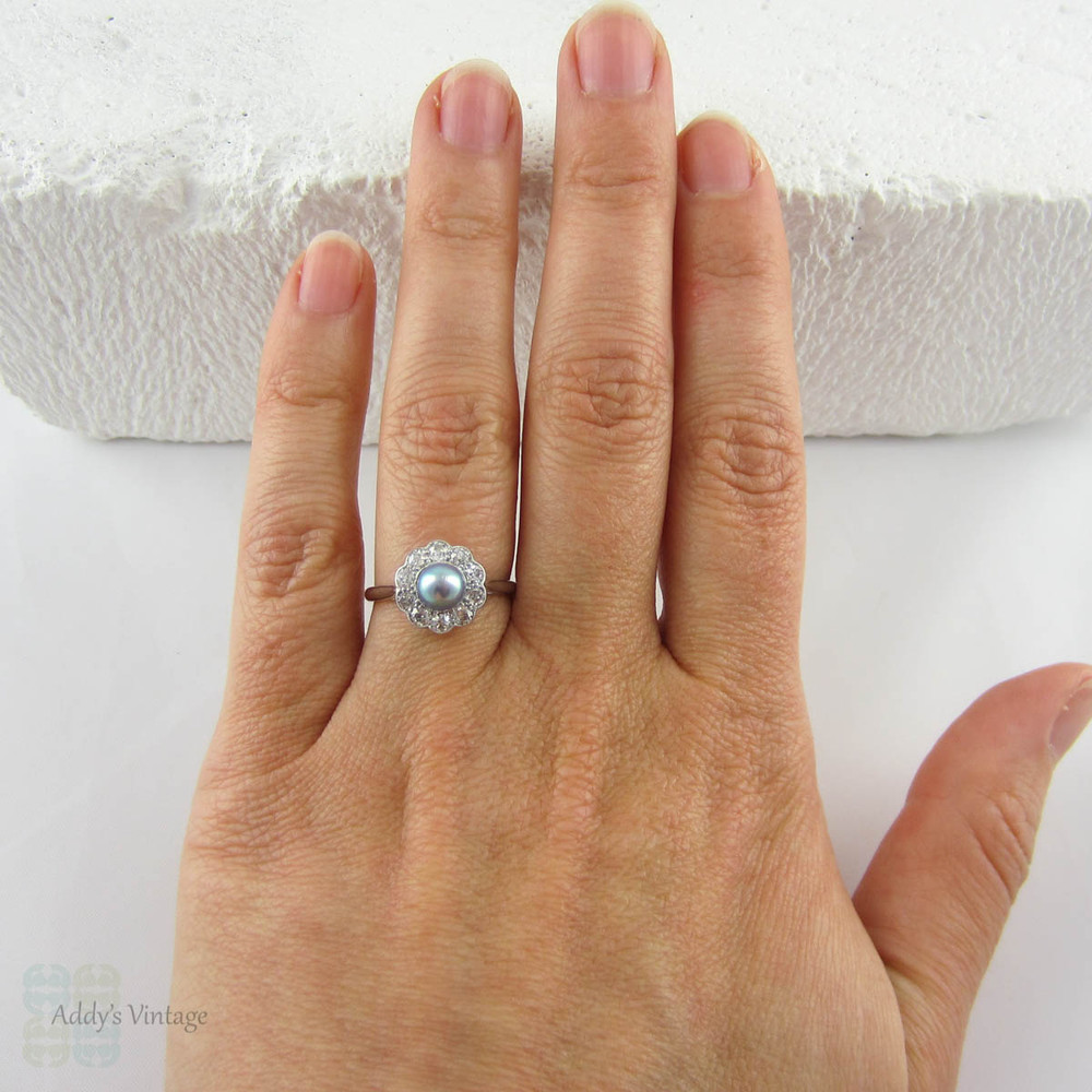 Antique Cultured Pearl Engagement Ring with Old Mine Cut Diamond Halo in Platinum, Edwardian and Diamond Cluster Ring, Circa 1900s.
