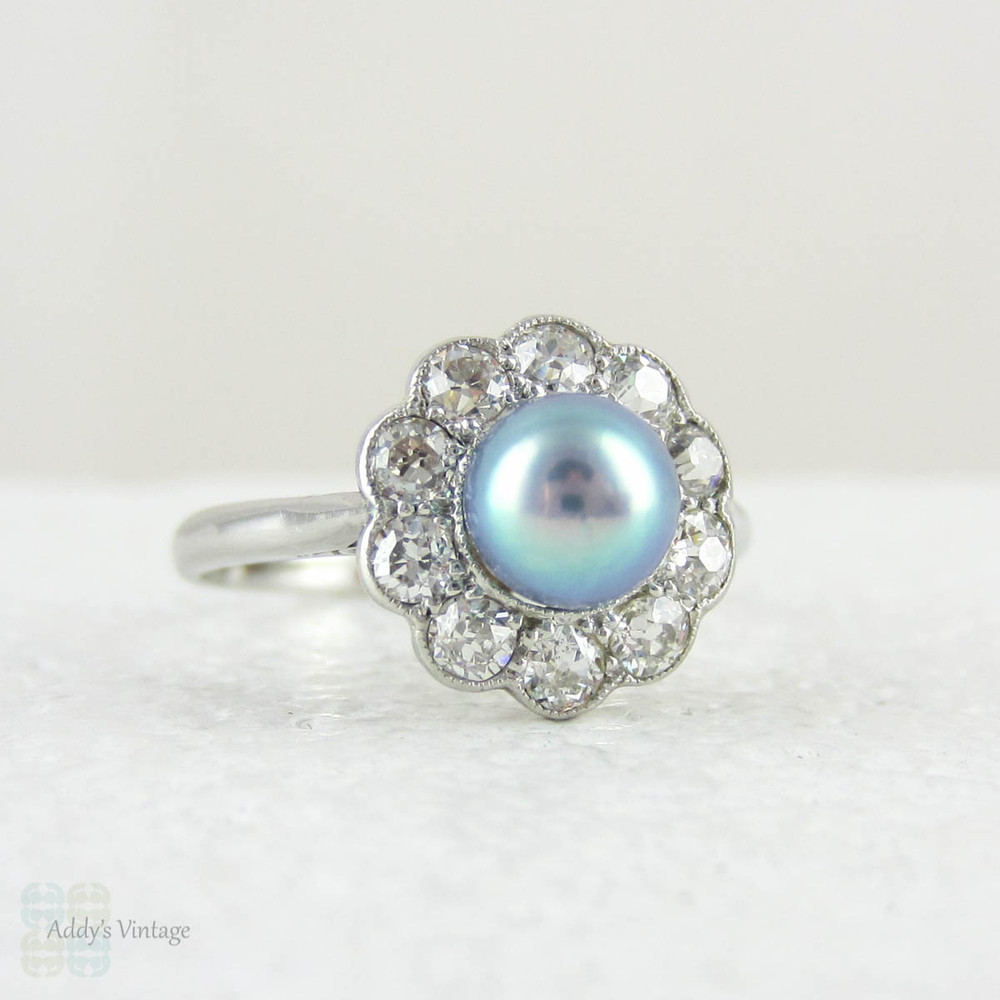 Antique Cultured Pearl Engagement Ring with Old Mine Cut Diamond Halo in Platinum, Edwardian and Diamond Cluster Ring, Circa 1900s.