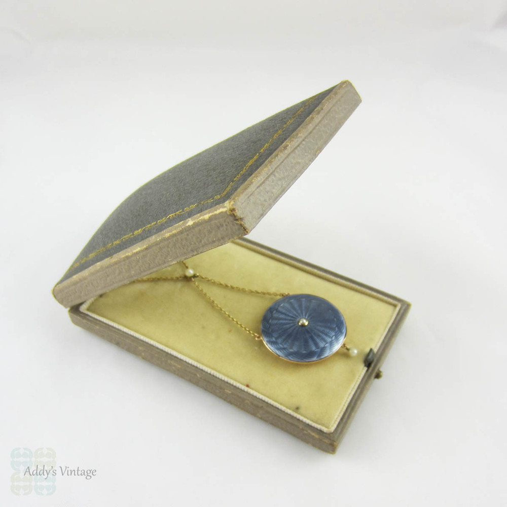 Antique Gold & Enamel Locket. Light Blue Guilloché Enamel Drop Necklace with Seed Pearls in Original Box, Circa 1900s.
