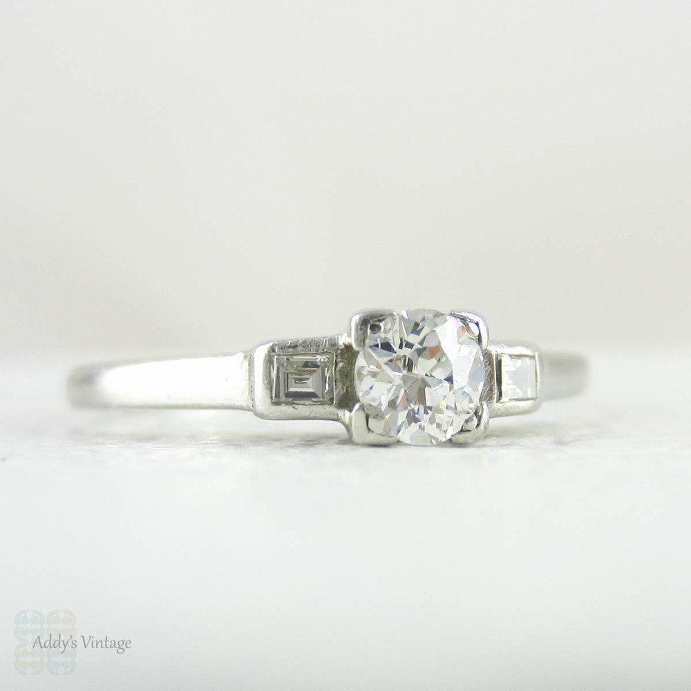 Old European Cut Diamond Engagement Ring with Straight Baguette Cut Accent Diamonds in Platinum, Circa 1930s Three Stone Diamond Ring.