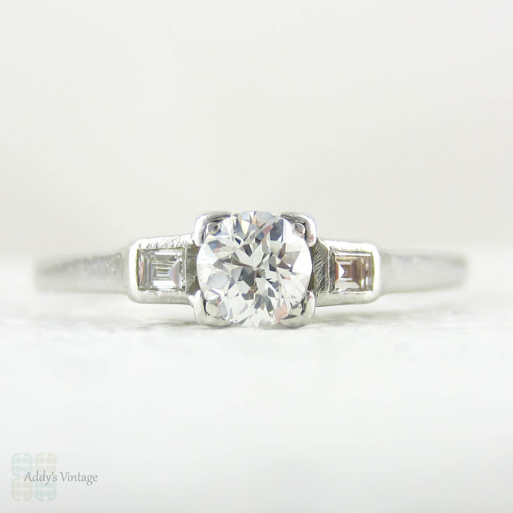 Old European Cut Diamond Engagement Ring with Straight Baguette Cut Accent Diamonds in Platinum, Circa 1930s Three Stone Diamond Ring.