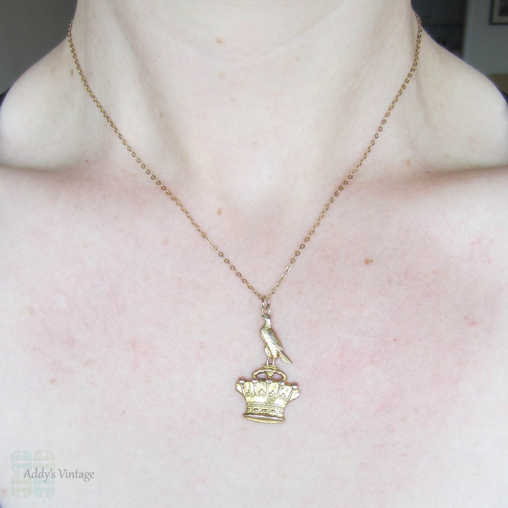 Antique Bird & Crown Pendant, 15 Carat Gold Pendant with Bird Sitting on Crown on 9 Karat Gold Chain, Circa 1910s.