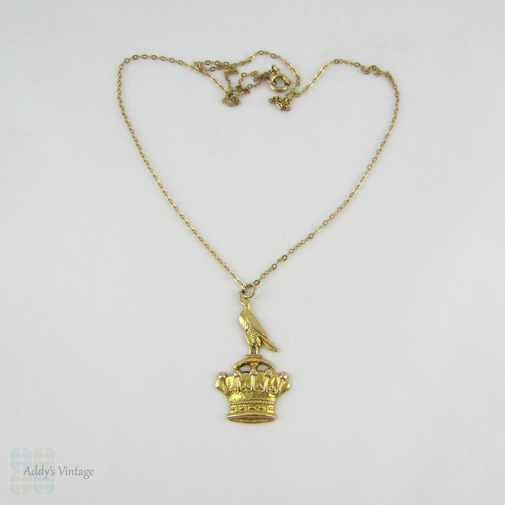Antique Bird & Crown Pendant, 15 Carat Gold Pendant with Bird Sitting on Crown on 9 Karat Gold Chain, Circa 1910s.
