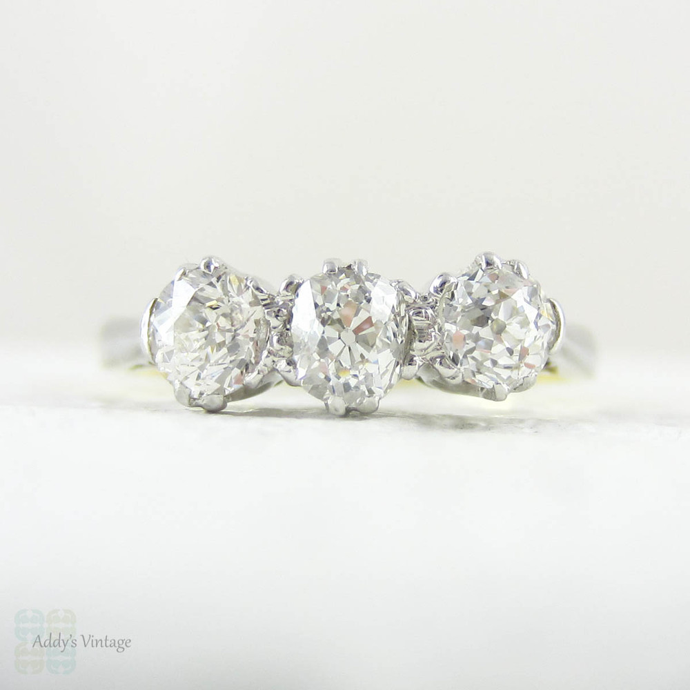 Deposit. Victorian Old Mine Cut Trilogy Ring, Engagement Ring set with Three Antique Diamonds in 18 Carat Gold and Platinum.