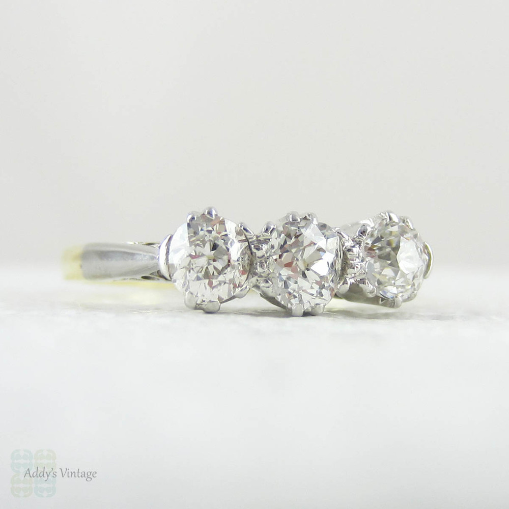 Deposit. Victorian Old Mine Cut Trilogy Ring, Engagement Ring set with Three Antique Diamonds in 18 Carat Gold and Platinum.