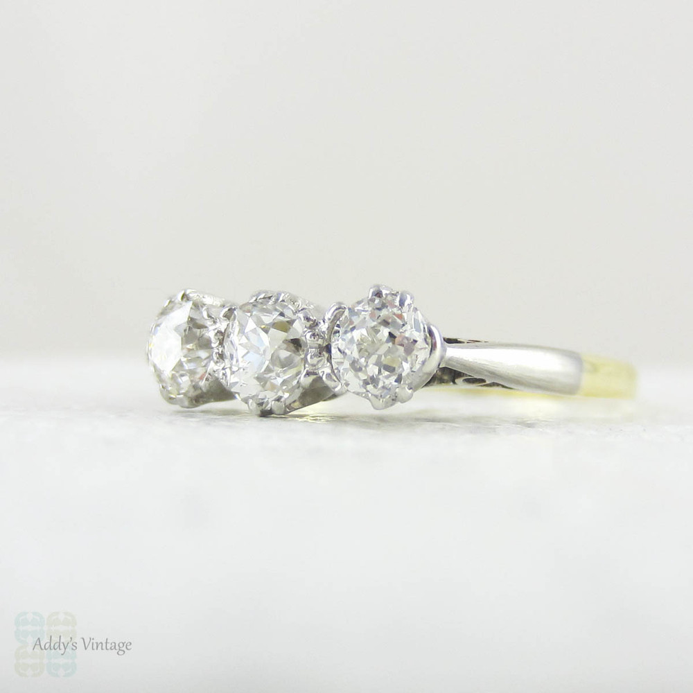 Deposit. Victorian Old Mine Cut Trilogy Ring, Engagement Ring set with Three Antique Diamonds in 18 Carat Gold and Platinum.