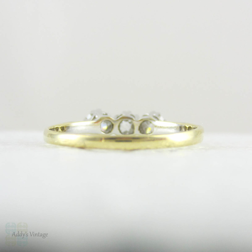 Deposit. Victorian Old Mine Cut Trilogy Ring, Engagement Ring set with Three Antique Diamonds in 18 Carat Gold and Platinum.