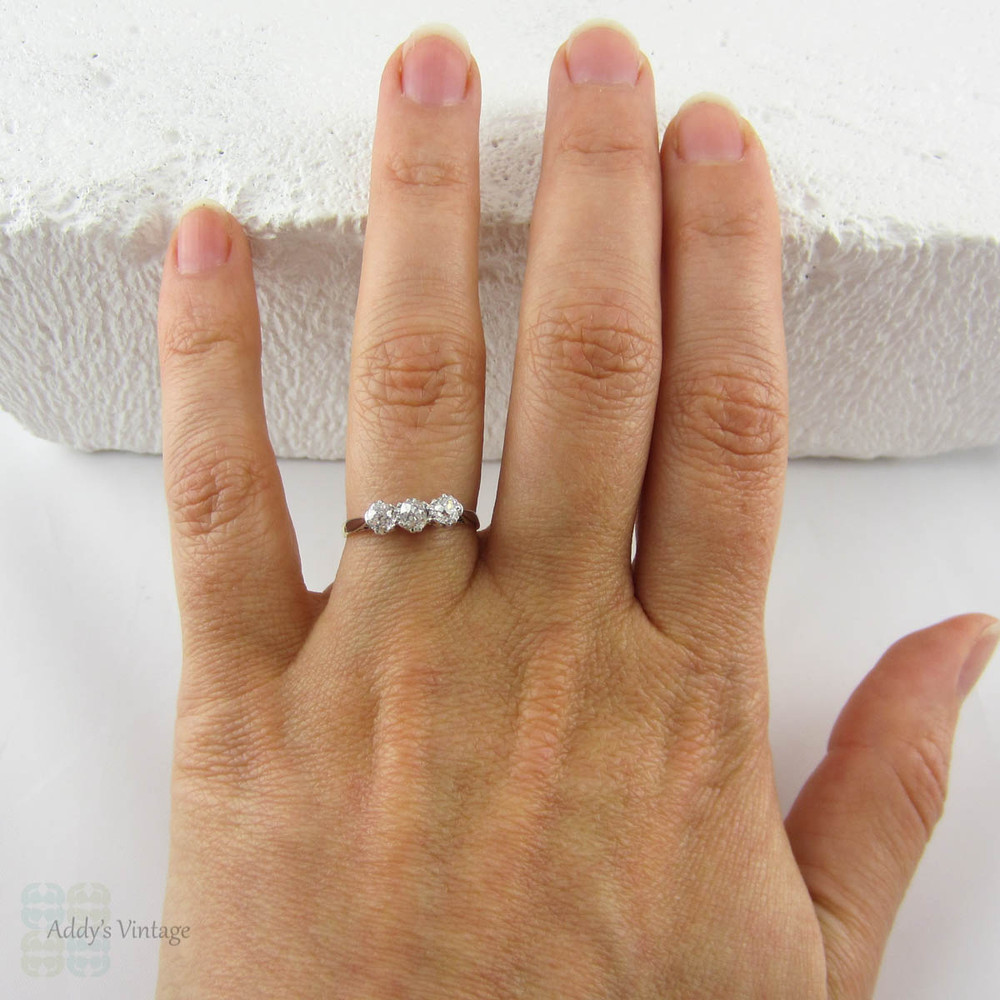 Deposit. Victorian Old Mine Cut Trilogy Ring, Engagement Ring set with Three Antique Diamonds in 18 Carat Gold and Platinum.