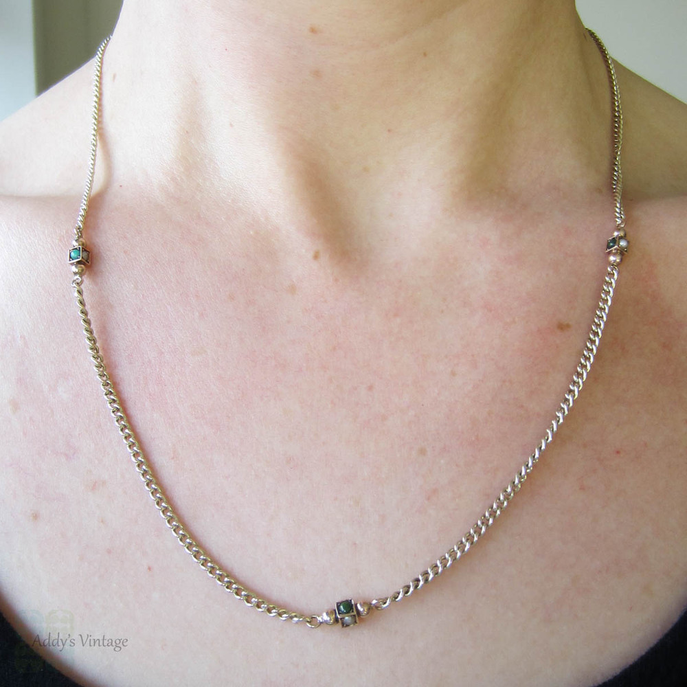 Victorian 9 Carat Gold Chain Necklace with Turquoise & Seed Pearls. Curb Link Chain with Square Turquoise & Seed Pearl Stations, Circa 1880s.