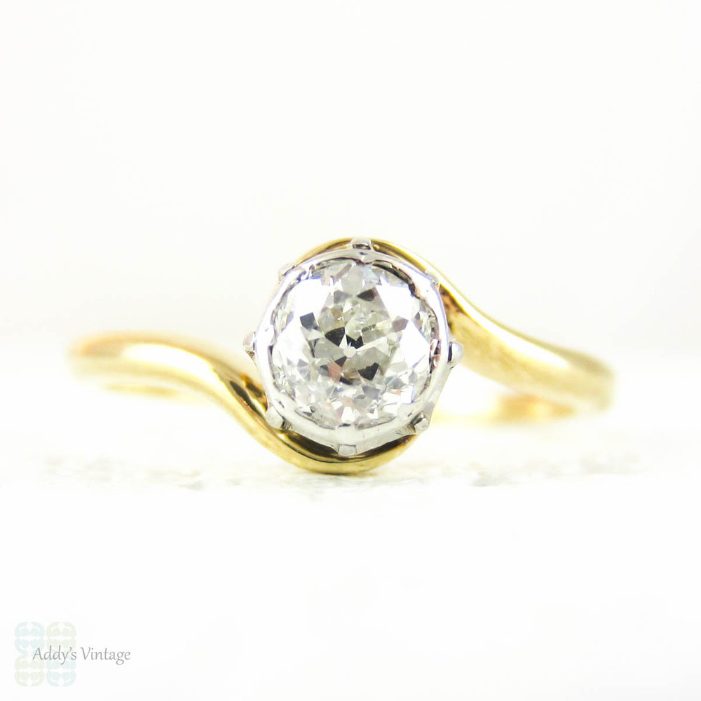 Vintage Diamond Solitaire Engagement Ring, Old Mine Cut Diamond, 18 Carat Gold Crossover Bypass Setting, Circa 1930s.