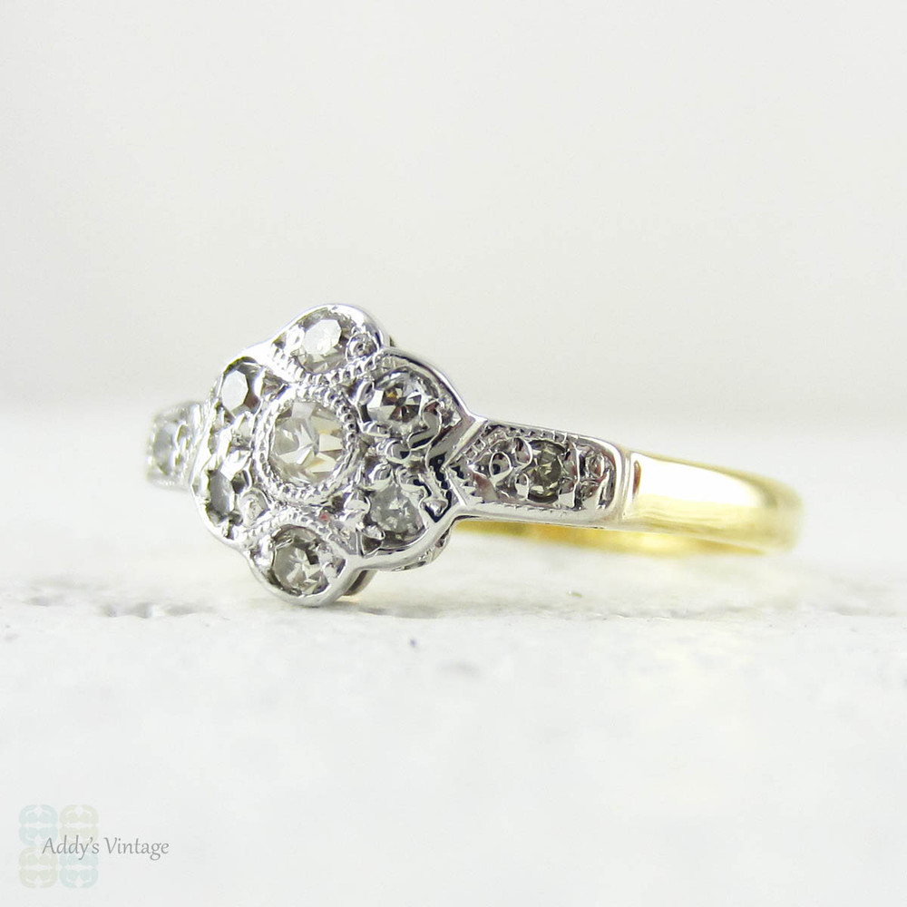 Antique Diamond Engagement Ring, Edwardian Daisy Shaped Scalloped Edged Diamond Cluster Ring. 18 Carat & Platinum, Circa 1910s.