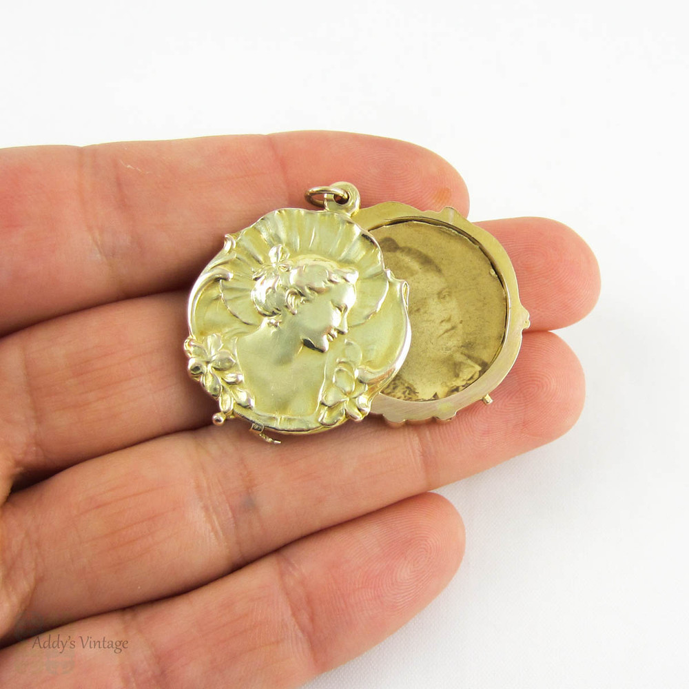 Art Nouveau Locket with Womans Figure & Floral Design, 9 Carat Yellow Gold Photograph Locket, Circa 1910s.