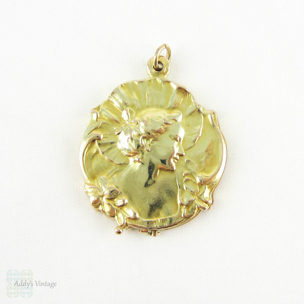 Art Nouveau Locket with Womans Figure & Floral Design, 9 Carat Yellow Gold Photograph Locket, Circa 1910s.