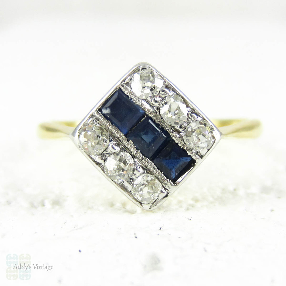 Art Nouveau Sapphire & Diamond Ring, Triple Row Square Shaped 1910s Ring Set with Blue Step Cut Sapphires & Old Cut Diamonds. 18 Carat Gold.
