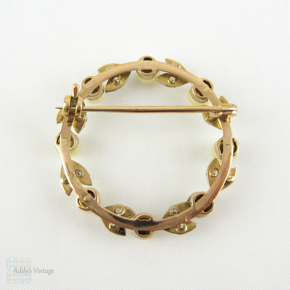 Edwardian Diamond & Pearl Brooch in 18ct Gold and Platinum. Wreath Circle Pin with Diamond Leaf Design and Miligrain, Circa 1900s.