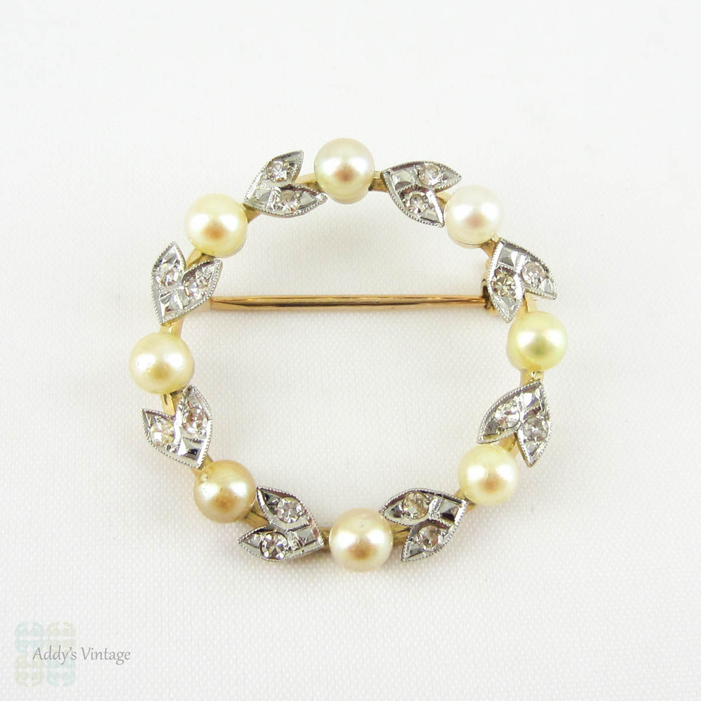 Edwardian Diamond & Pearl Brooch in 18ct Gold and Platinum. Wreath Circle Pin with Diamond Leaf Design and Miligrain, Circa 1900s.