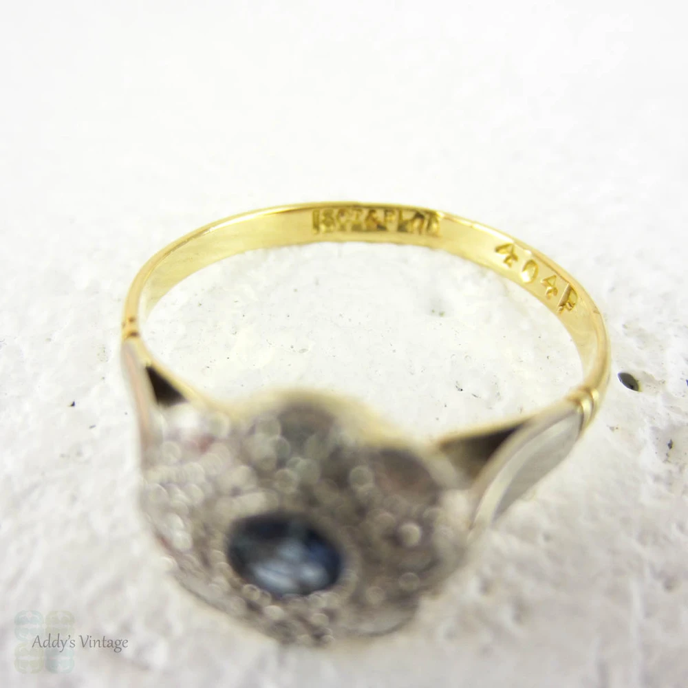 Sapphire & Diamond Daisy Engagement Ring, Blue Sapphire in Floral Shape Diamond Halo with Milgrain. Circa 1930s, 18ct & Platinum.