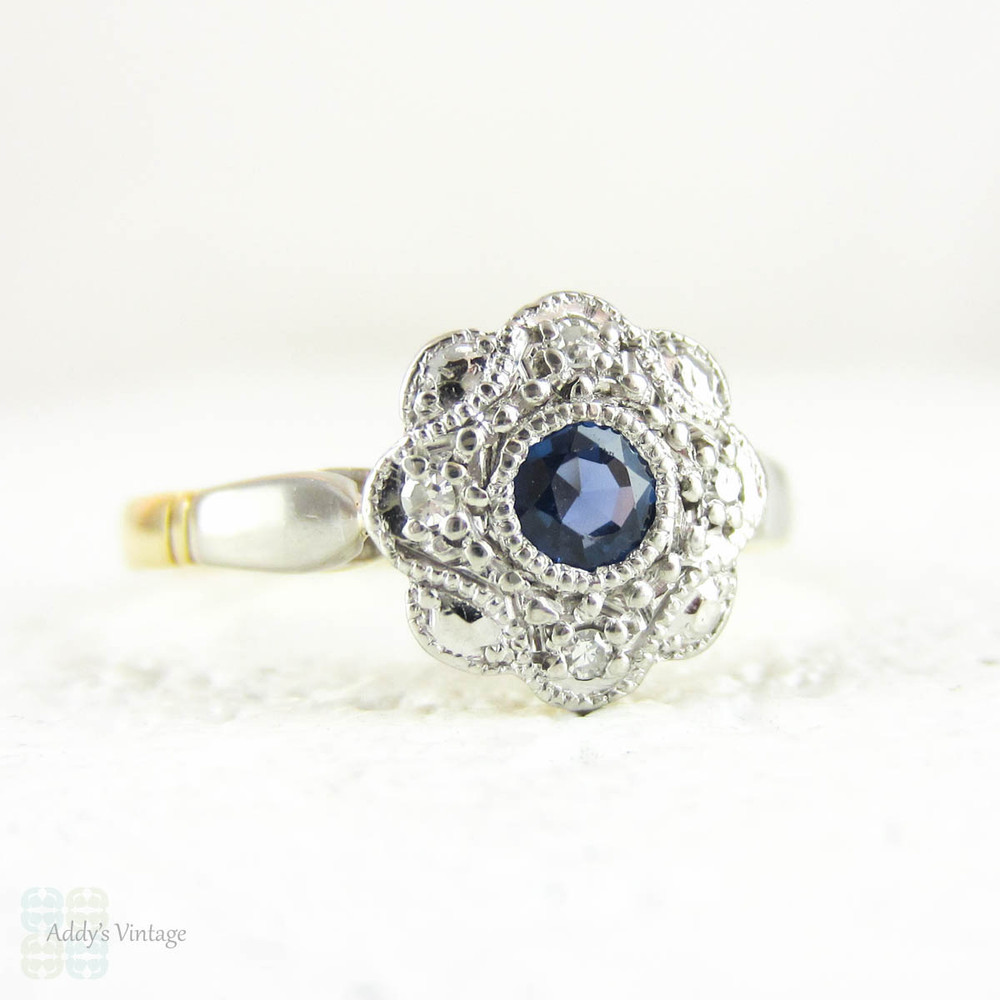 Sapphire & Diamond Daisy Engagement Ring, Blue Sapphire in Floral Shape Diamond Halo with Milgrain. Circa 1930s, 18ct & Platinum.