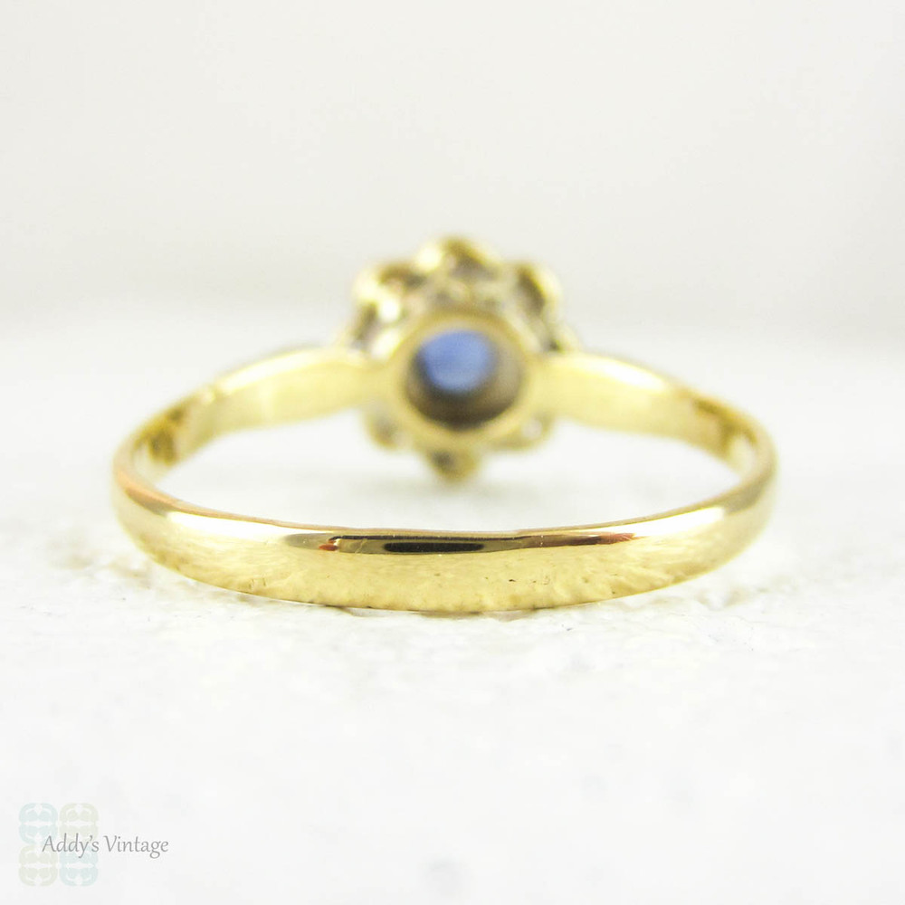 Sapphire & Diamond Daisy Engagement Ring, Blue Sapphire in Floral Shape Diamond Halo with Milgrain. Circa 1930s, 18ct & Platinum.