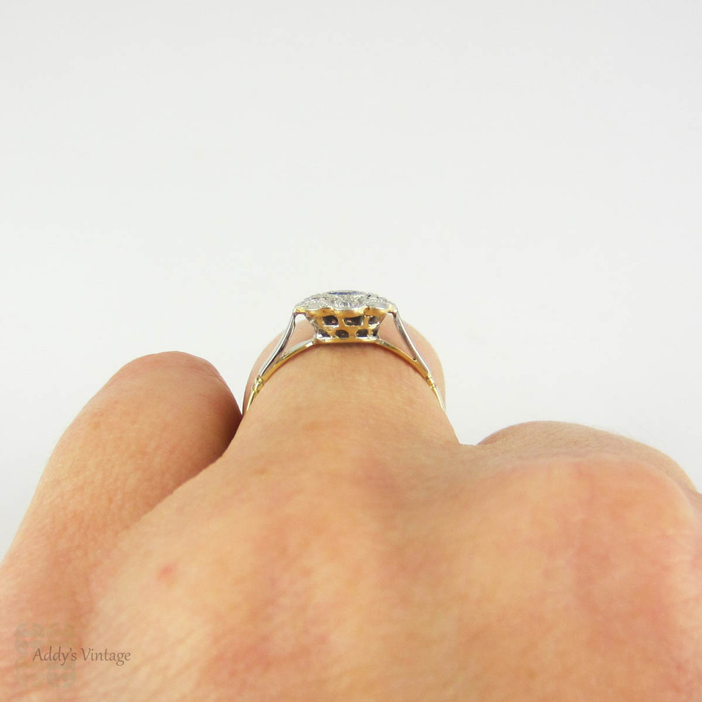 Sapphire & Diamond Daisy Engagement Ring, Blue Sapphire in Floral Shape Diamond Halo with Milgrain. Circa 1930s, 18ct & Platinum.