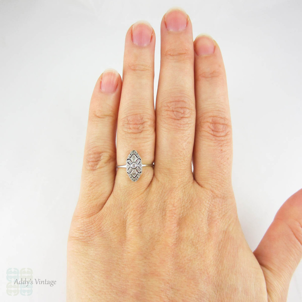 Art Deco German Diamond Ring, Pierced Filigree Plaque Shape Oblong Panel Ring in 14 Carat Gold & Platinum, Circa 1930s.