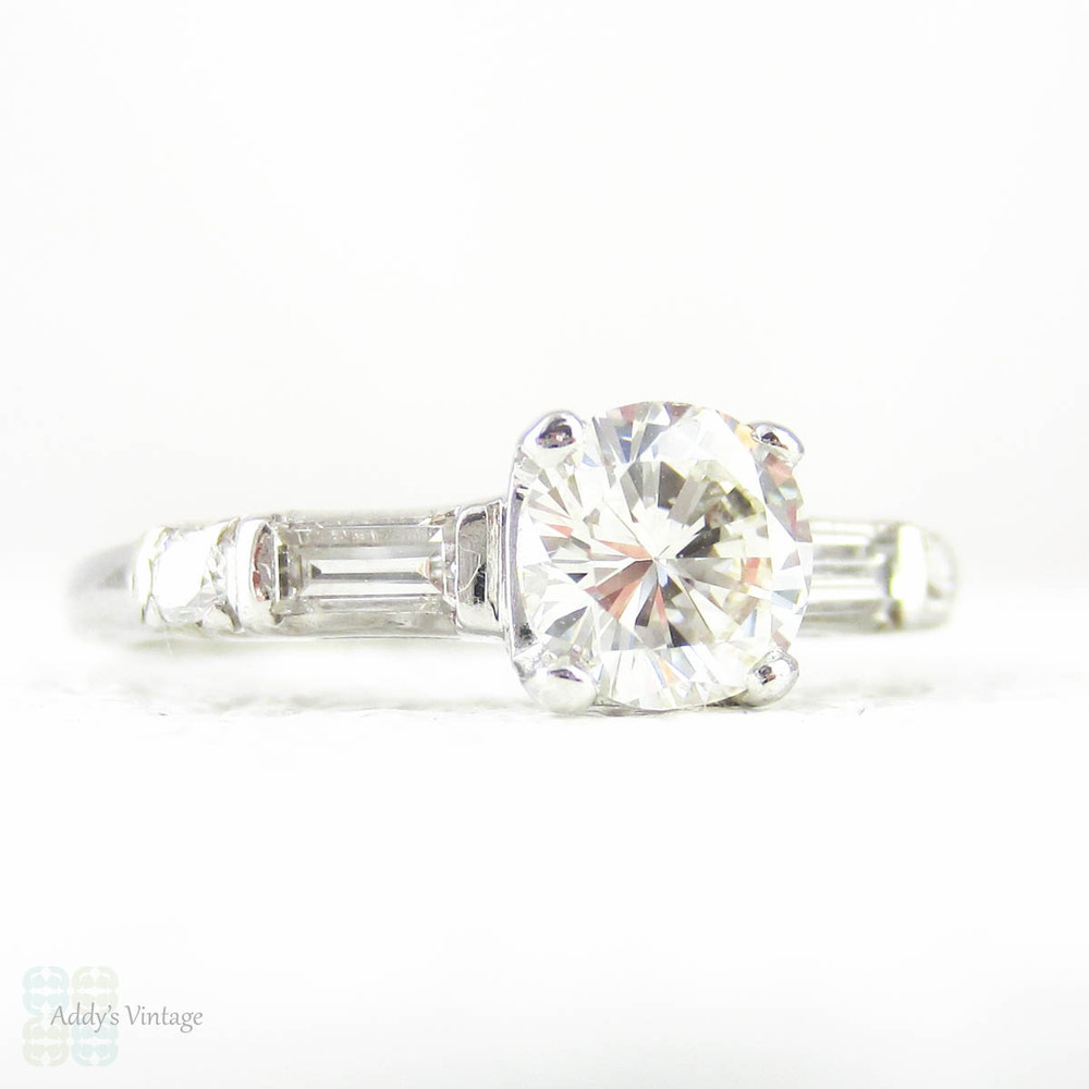 Vintage Diamond Engagement Ring, Early Round Brilliant Cut Diamond & Straight Baguettes. Stamped Platinum Setting, 1 ctw, Circa 1930s.