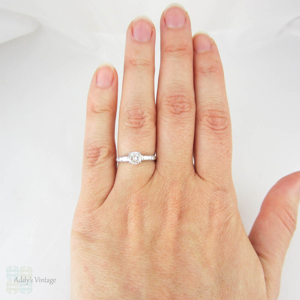 Vintage Diamond Engagement Ring, Early Round Brilliant Cut Diamond & Straight Baguettes. Stamped Platinum Setting, 1 ctw, Circa 1930s.