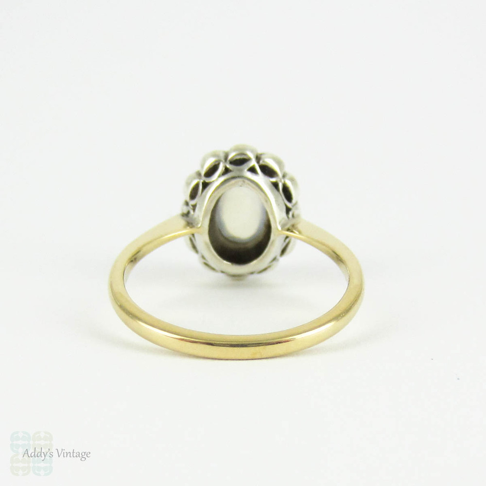 Vintage Moonstone & Paste Halo Ring, Oval Cabochon Moonstone with Diamond Paste Halo in 9 Carat Yellow Gold in Sterling Silver, Circa 1930s.