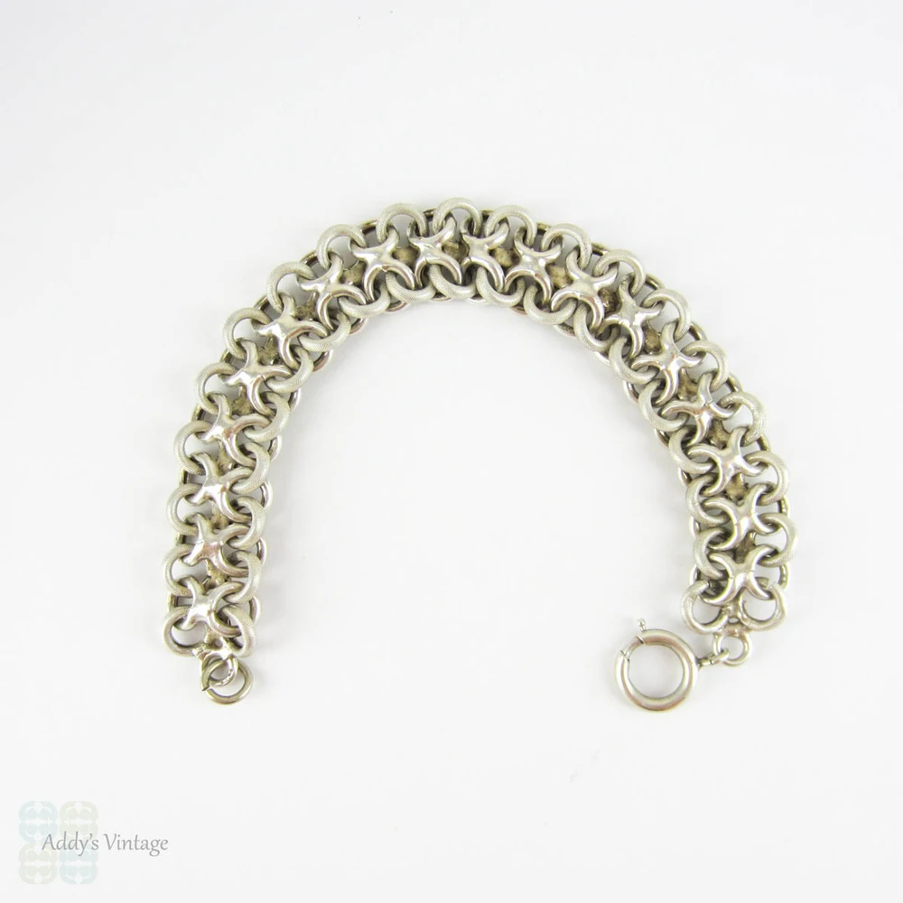 Vintage French Bracelet, Sterling Silver Alternating Beaded Texture & Shiny Figure 8 Links with 9 Carat Rose Gold Accents. Circa 1940s.