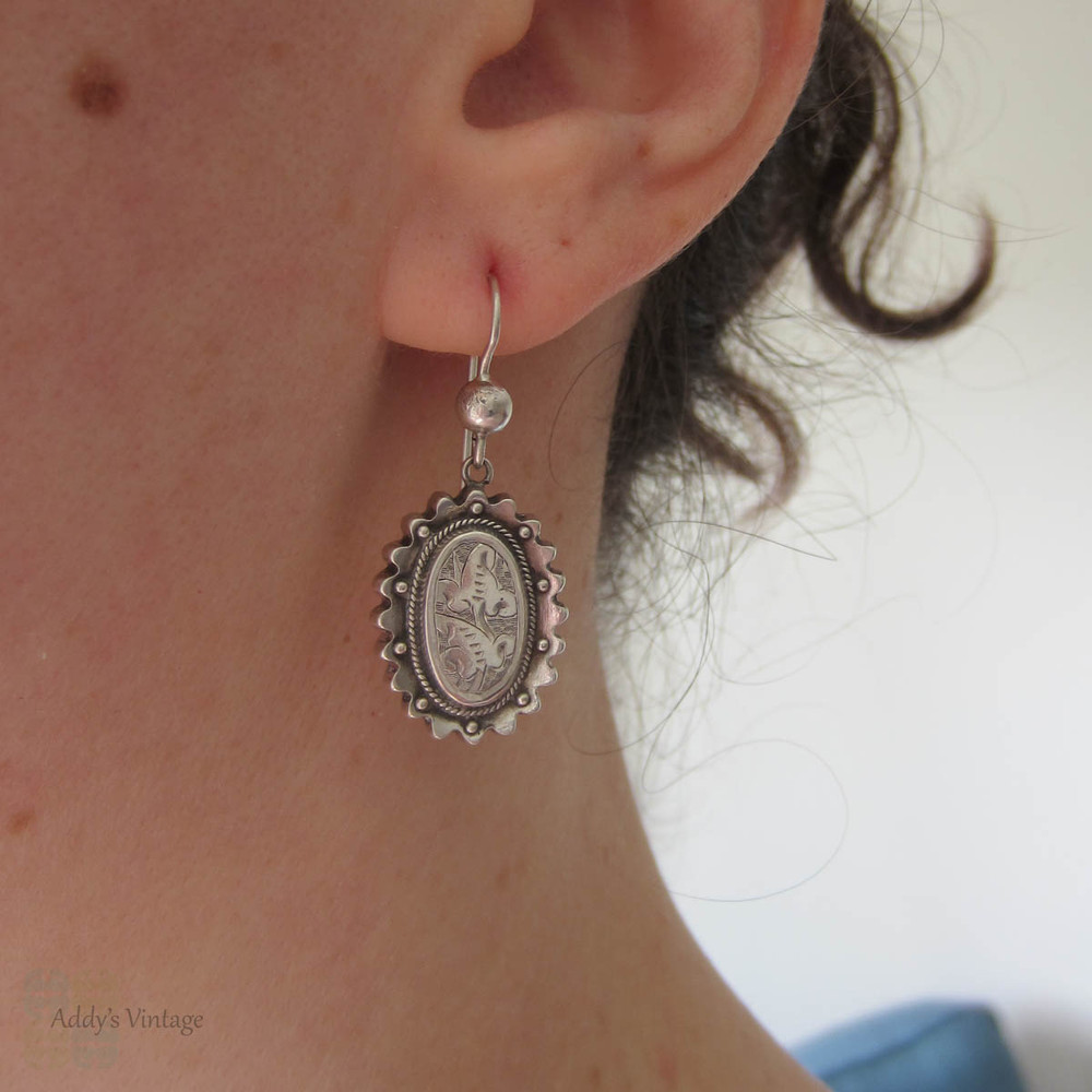 Victorian Aesthetic Movement Earrings, Sterling Silver Engraved Floral Foliate Design Oval Shape Dangle Earrings, Circa 1880s.