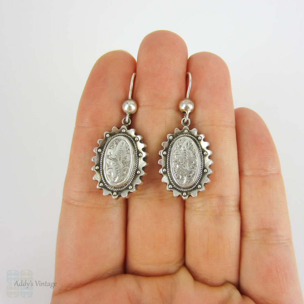 Victorian Aesthetic Movement Earrings, Sterling Silver Engraved Floral Foliate Design Oval Shape Dangle Earrings, Circa 1880s.
