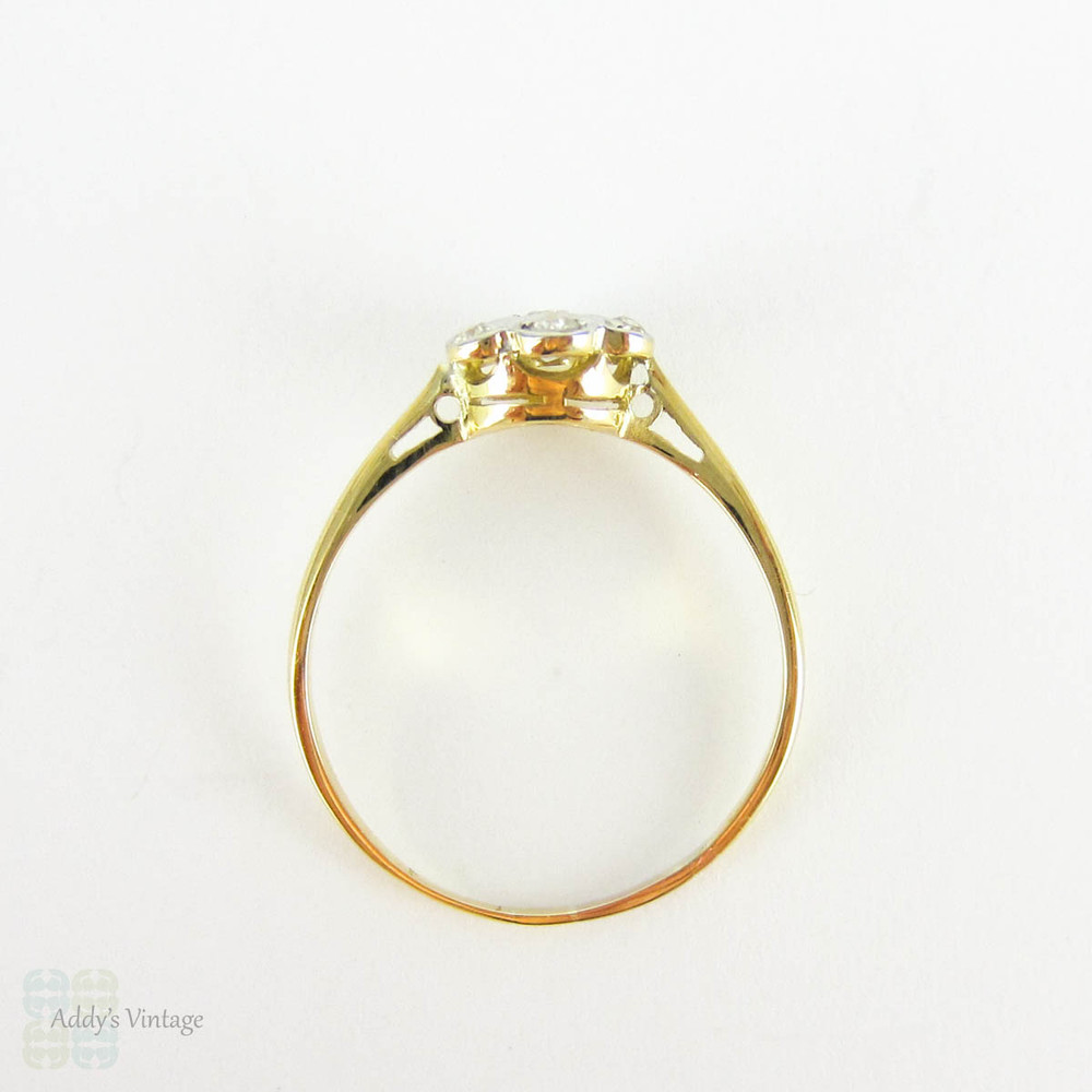 Antique Floral Shape Engagement Ring, 7 Stone Diamond Cluster Ring in Daisy Flower Design. Circa 1910s, 18 Carat Gold.