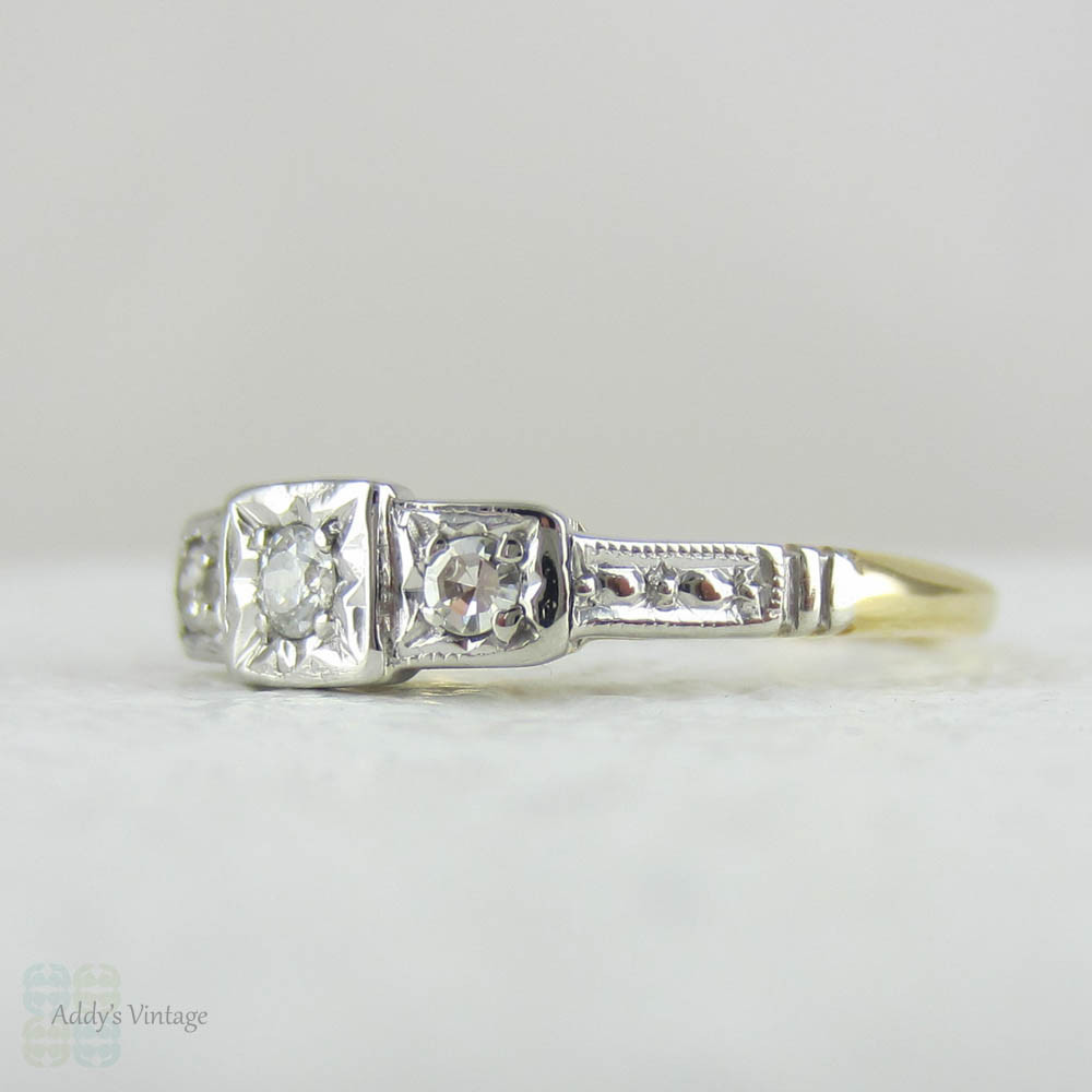 Art Deco Diamond Engagement Ring. Three Stone Trilogy Ring with Engraved Shoulders in Yellow Gold with Platinum Top, Circa 1920s.