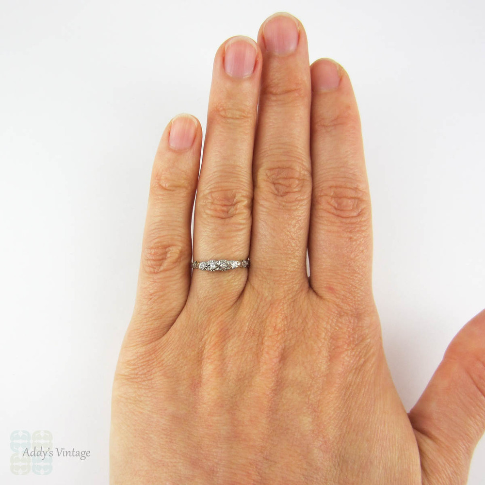 Vintage Diamond Wedding Ring, Four Stone Illusion Set Diamond Band. Circa 1940s, 18 Carat Yellow Gold & Platinum.