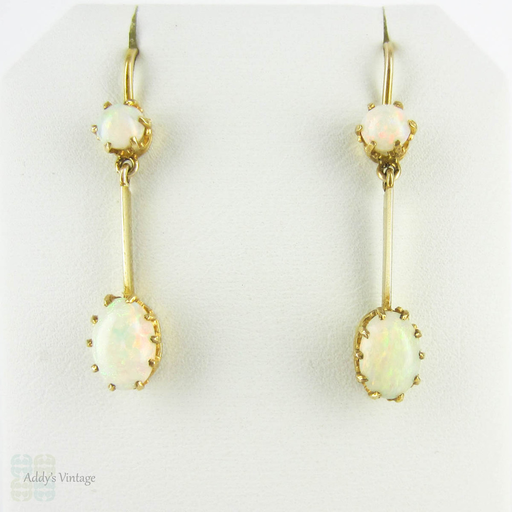 Antique Opal Dangle Earrings, Double Oval Cabochon Cut Opal. Circa 1900s, 9 Carat Yellow Gold.