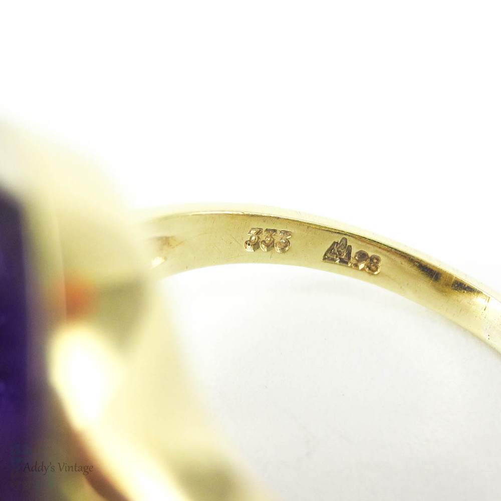 Modernist Amethyst Cocktail Ring, Royal Purple Cabochon Cut Amethyst in 8 Carat Gold Convex Split Shape Setting. Circa 1960s.