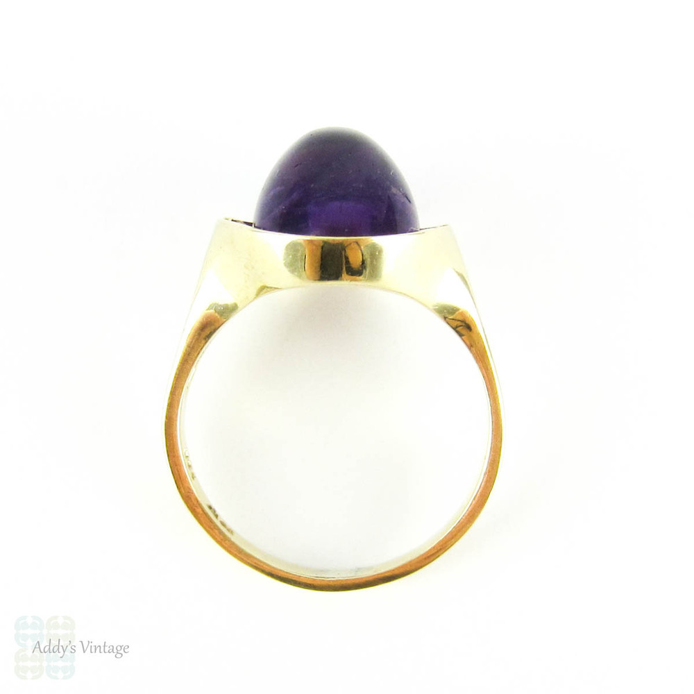 Modernist Amethyst Cocktail Ring, Royal Purple Cabochon Cut Amethyst in 8 Carat Gold Convex Split Shape Setting. Circa 1960s.