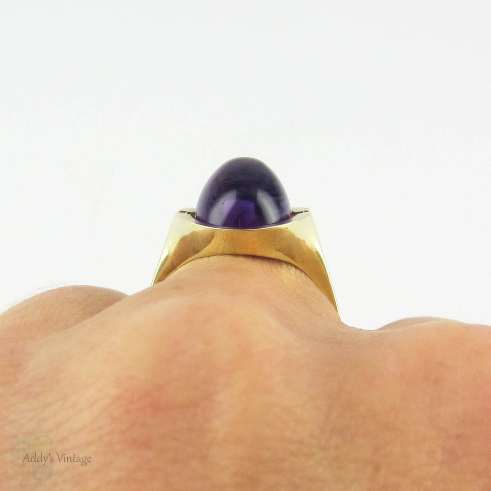 Modernist Amethyst Cocktail Ring, Royal Purple Cabochon Cut Amethyst in 8 Carat Gold Convex Split Shape Setting. Circa 1960s.