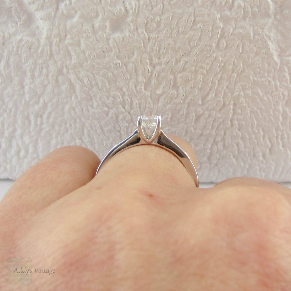 Round Brilliant Diamond Engagement Ring with Channel Set Side Stones in 18 Carat White Gold. Classic Style Estate Diamond Ring.