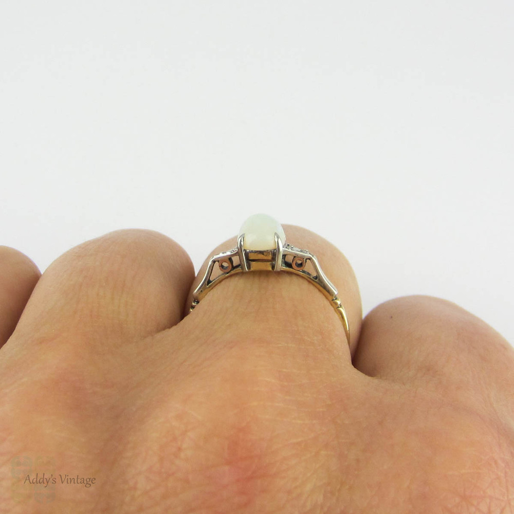 Vintage Opal Single Stone Ring, Oval Cabochon in 9 Carat White & Yellow Gold Setting. Circa 1940s.