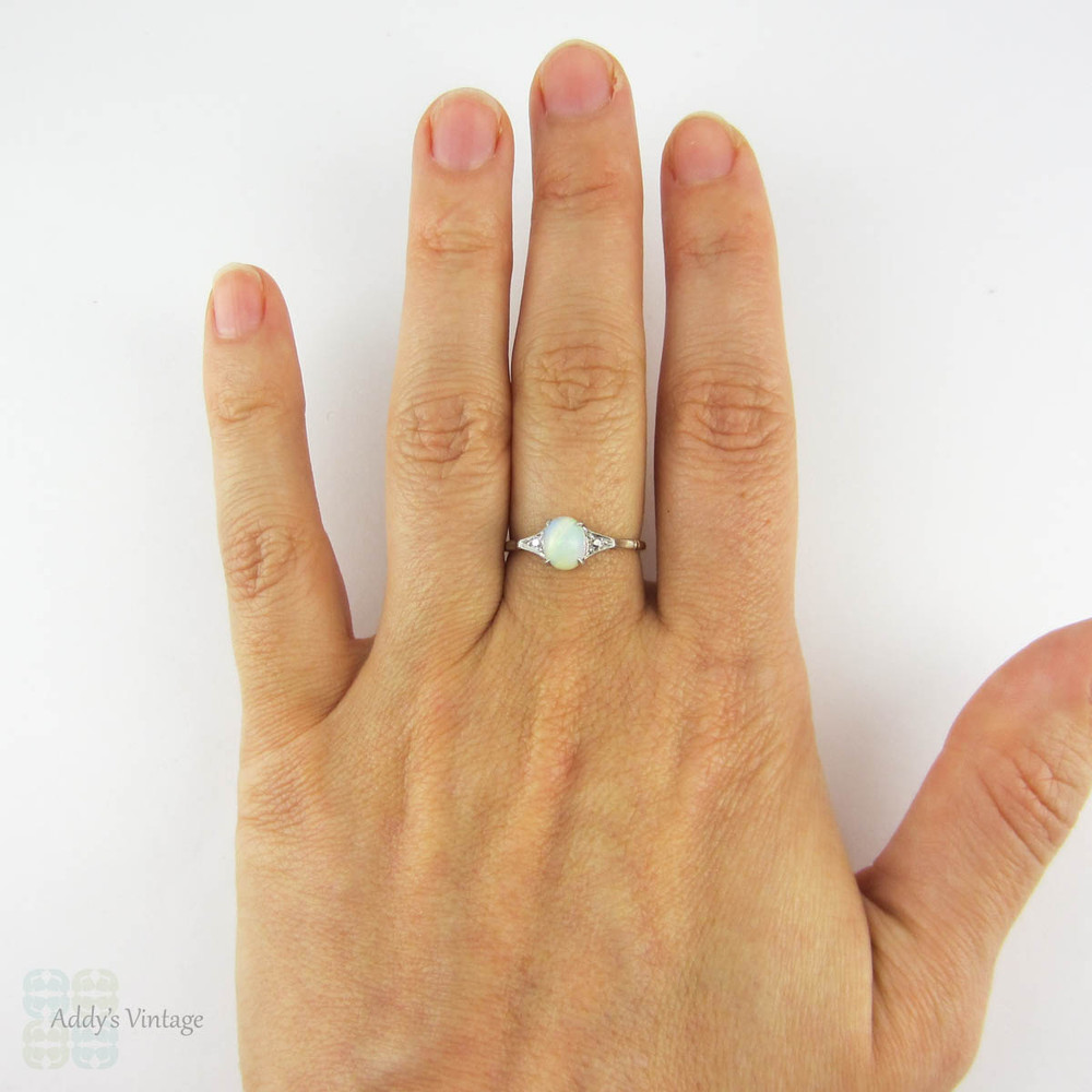 Vintage Opal Single Stone Ring, Oval Cabochon in 9 Carat White & Yellow Gold Setting. Circa 1940s.