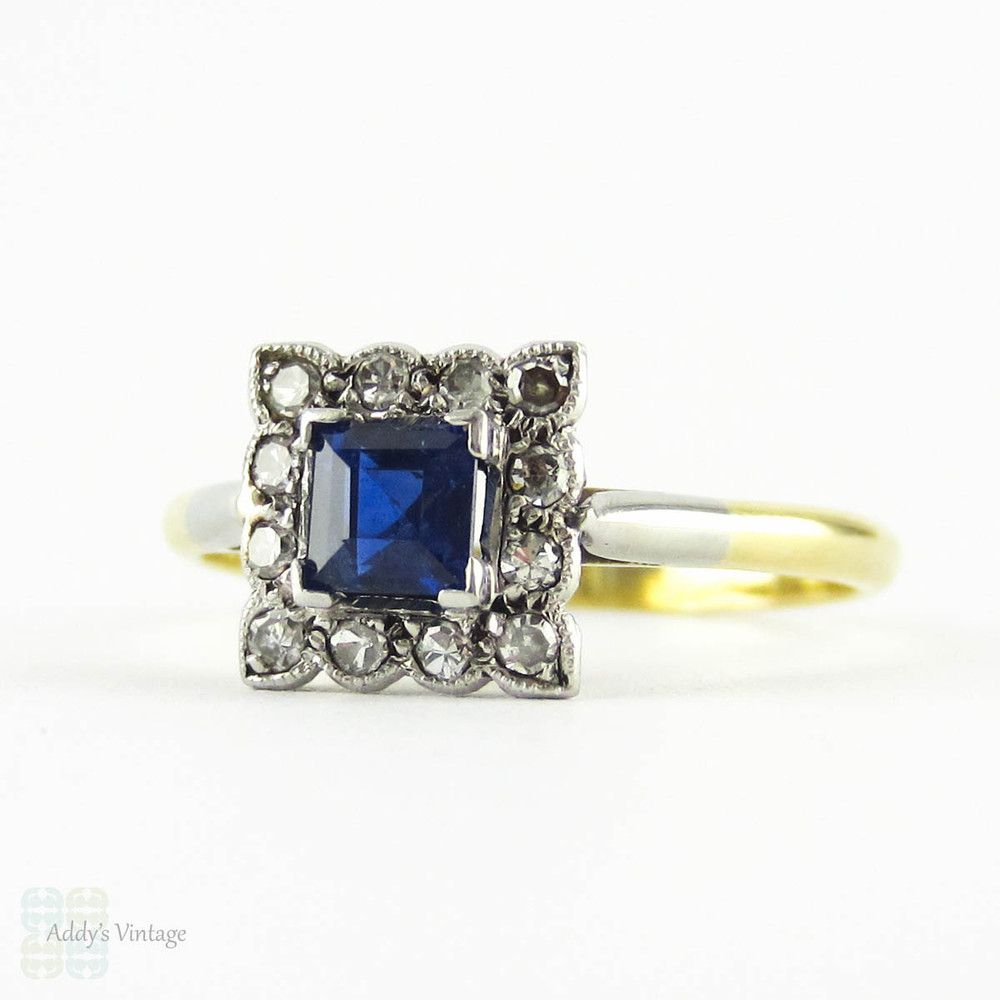 Art Deco Sapphire & Diamond Engagement Ring, Square Blue Sapphire with Milgain Detail Diamond Halo. Circa 1920s, 18ct Platinum.