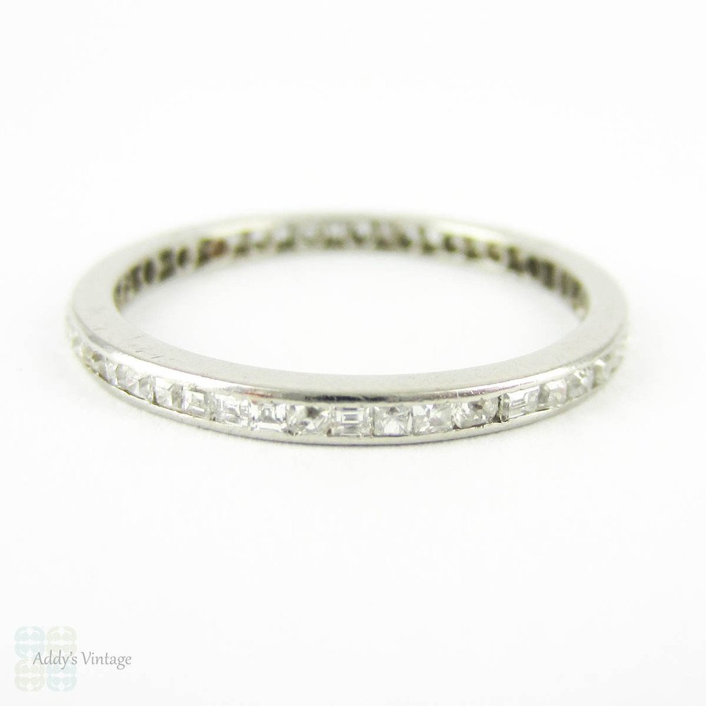 Art Deco Diamond Eternity Ring, Square Table Cut & Carre Cut Diamonds in Channel Set Band. Platinum, Circa 1920s, Size O.5 / 7.5.