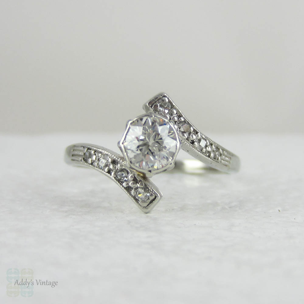 Antique Diamond Engagement Ring. Old European Cut Diamond in White Gold Bypass Style Setting, Circa Early 1900s.