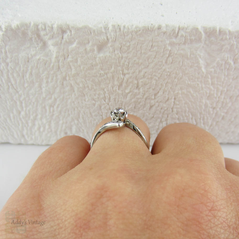 Antique Diamond Engagement Ring. Old European Cut Diamond in White Gold Bypass Style Setting, Circa Early 1900s.